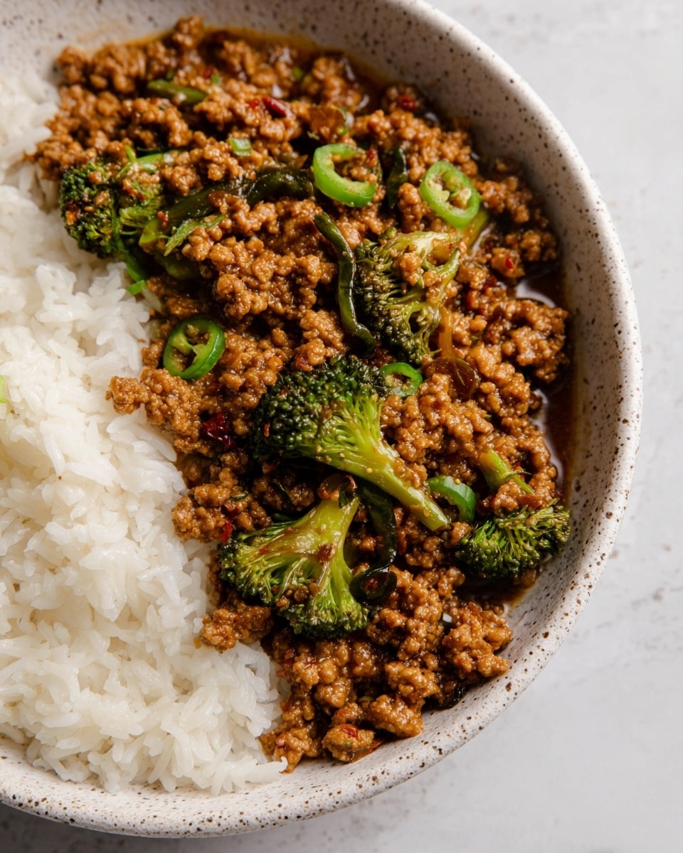 The image shows a close-up of two shrimp wraps stacked on a white plate, each wrap cut diagonally to reveal the inside. The outer layer is a soft, lightly browned flatbread with subtle grill marks. Inside, the first layer is bright green lettuce leaves, providing a fresh, crisp texture. On top of the lettuce, there are plump, pink grilled shrimp with light char marks, accompanied by small orange pieces that appear to be roasted sweet potatoes or carrots. There is also a creamy light-colored sauce, smoothly spread and visible between the shrimp and lettuce. The background is a white marbled surface. Photo taken with an iphone --ar 4:5 --v 7
