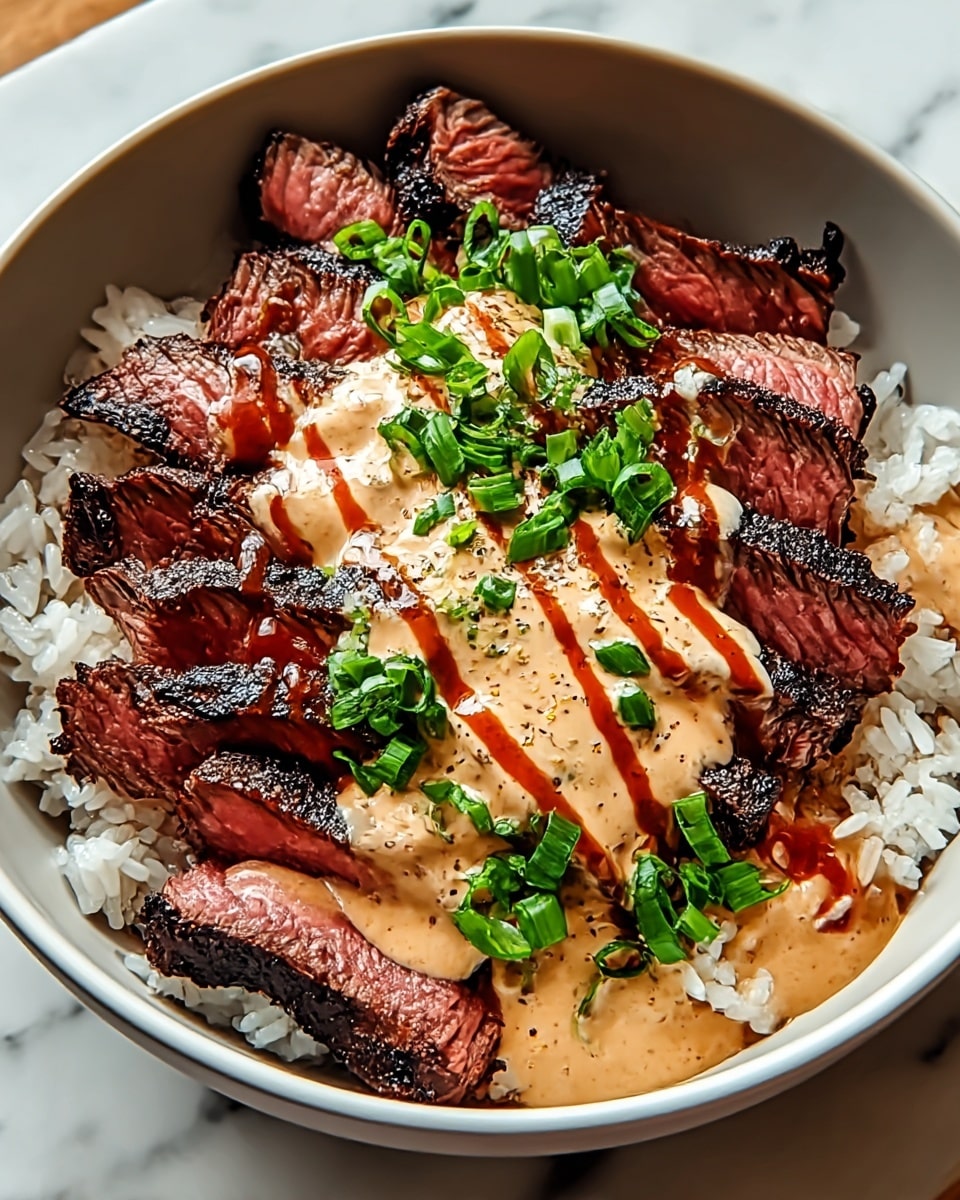 A bowl with a base layer of white rice, soft and slightly sticky, fills the bottom. On top, there are many slices of grilled steak arranged close together, showing a charred dark brown outside and a pinkish red inside. A creamy, tan sauce with pepper specks covers the middle part of the steak, with thin streams of a reddish-brown drizzle over it. Fresh, bright green chopped scallions are scattered on the sauce, adding a pop of vivid color. The bowl is white with a smooth finish, placed on a white marbled surface. Photo taken with an iphone --ar 4:5 --v 7