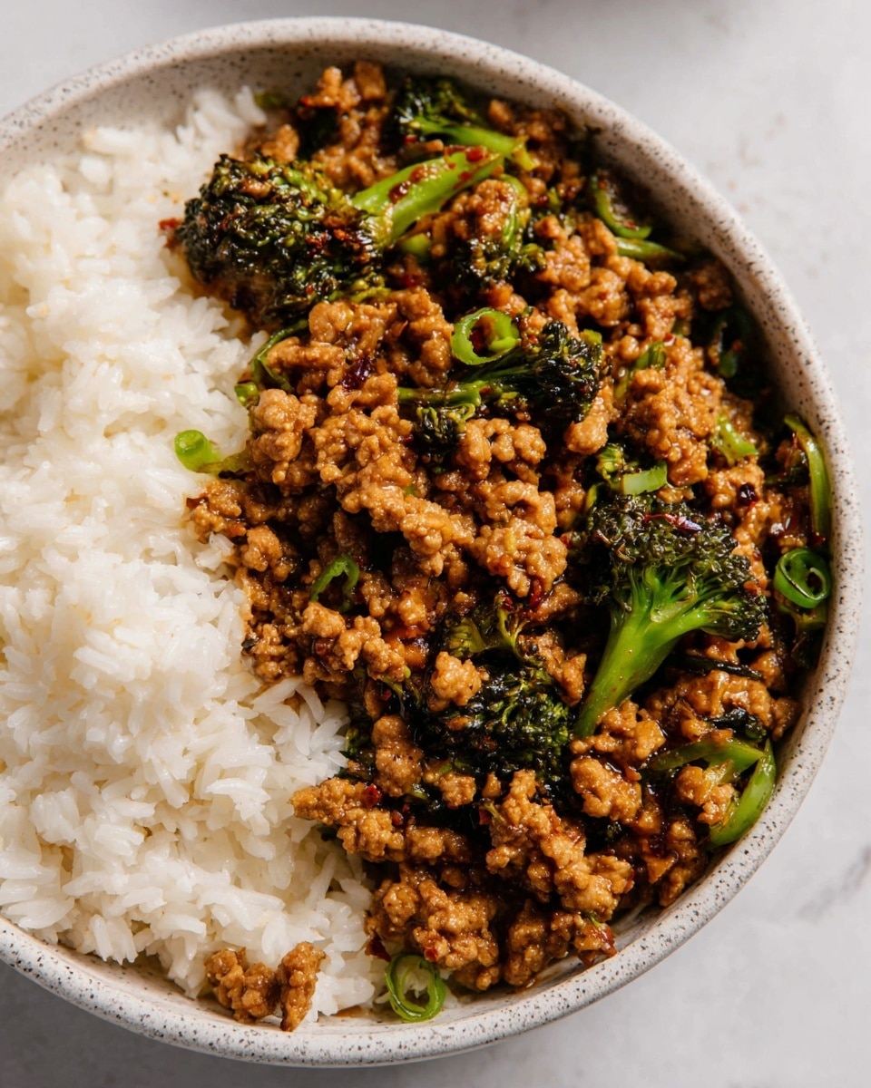 A close-up of two shrimp wraps cut in half and stacked on a white plate. Each wrap is made with a soft, light brown flatbread folded around fresh green lettuce as the base layer. On top of the lettuce, there are plump, grilled shrimp with a slight char, showing a light pink and white color with golden-brown grill marks. Bright orange roasted carrot pieces are mixed in with the shrimp, adding a pop of color. A creamy, light-colored sauce with fresh herb specks coats the shrimp and vegetables, visible inside the wrap. The plate sits on a white marbled surface. photo taken with an iphone --ar 4:5 --v 7