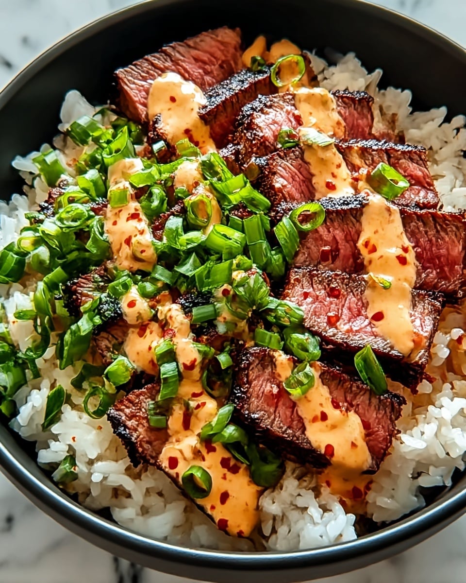 A bowl filled with a base layer of white rice, topped with a layer of grilled steak slices that are medium-rare with a dark char on the edges. Over the steak, there is a layer of creamy, light orange sauce with red specks spread unevenly. The dish is finished with a generous layer of chopped bright green onions scattered on top. The bowl is white with a thin gold rim, all placed on a white marbled surface. Photo taken with an iphone --ar 4:5 --v 7